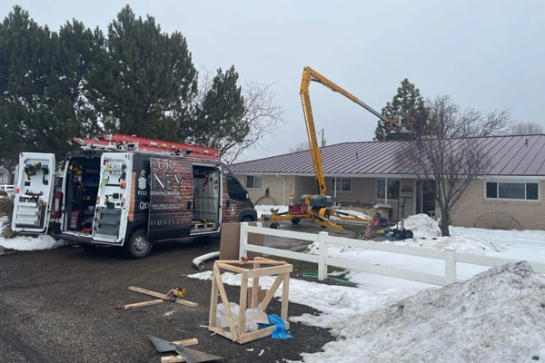 Emergency crews gather outside a property recently serviced by Safer Chimney LLC for chimney inspection.