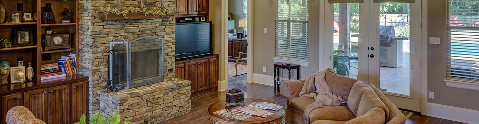 Wood furniture and stonework complement fireplace repair completed by Safer Chimney LLC.